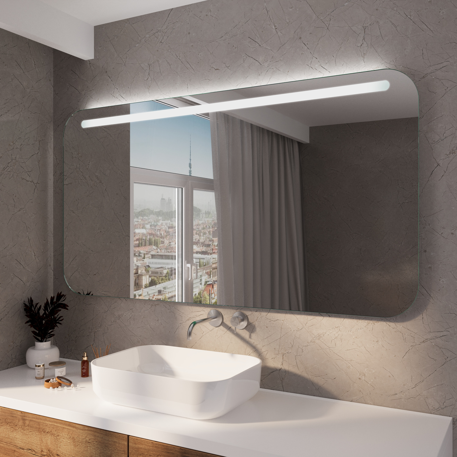 CRATO RAD rechteckiger LED-Badspiegel mit abgerundeten Ecken und eingeschalteter Beleuchtung, 1500x1500 mm, leuchtend mit weißem oberen Lichtstreifen, über weißem Waschtisch mit rundem Aufsatzwaschbecken, goldene Armatur, minimalistisches Bad