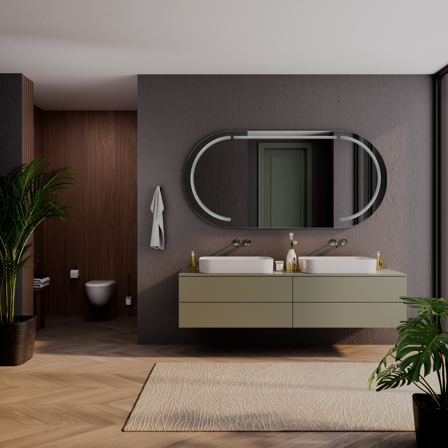 BASTIA OV ovaler LED-Badspiegel mit ausgeschalteter Beleuchtung, 1500x1500 mm, über zwei weißen rechteckigen Aufsatzwaschbecken auf olivgrünem schwebendem Waschtisch, luxuriöses Bad mit dunkelgrauer Wand, Holzverkleidung, Grünpflanzen und hellem Teppich