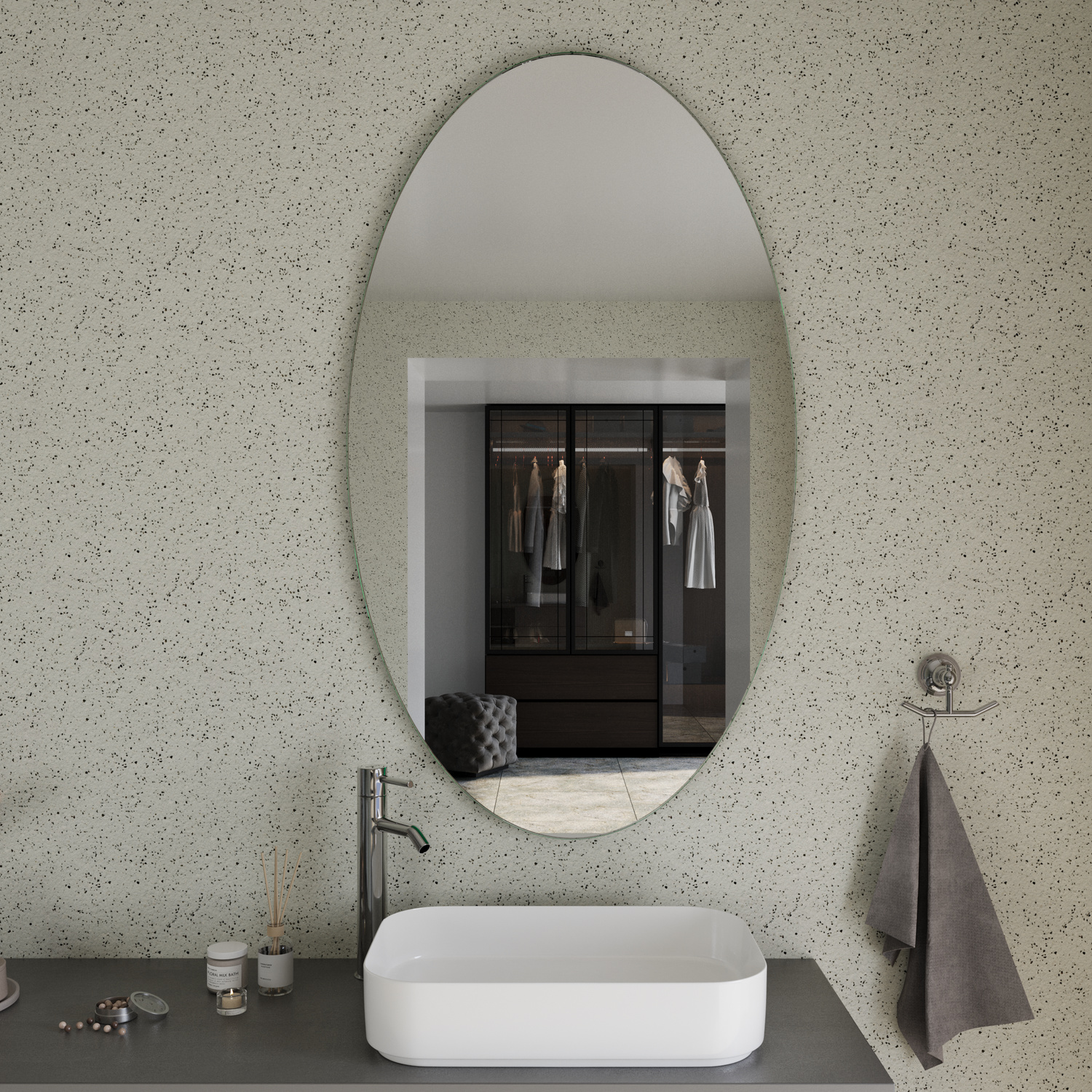LAMBELLE EL ovaler LED-Badspiegel mit ausgeschalteter Beleuchtung, 1500x1500 mm, nahe Ansicht, über weißem Aufsatzwaschbecken auf hellem Waschtisch, minimalistisches Bad mit strukturierter Tapete und grauem Handtuch