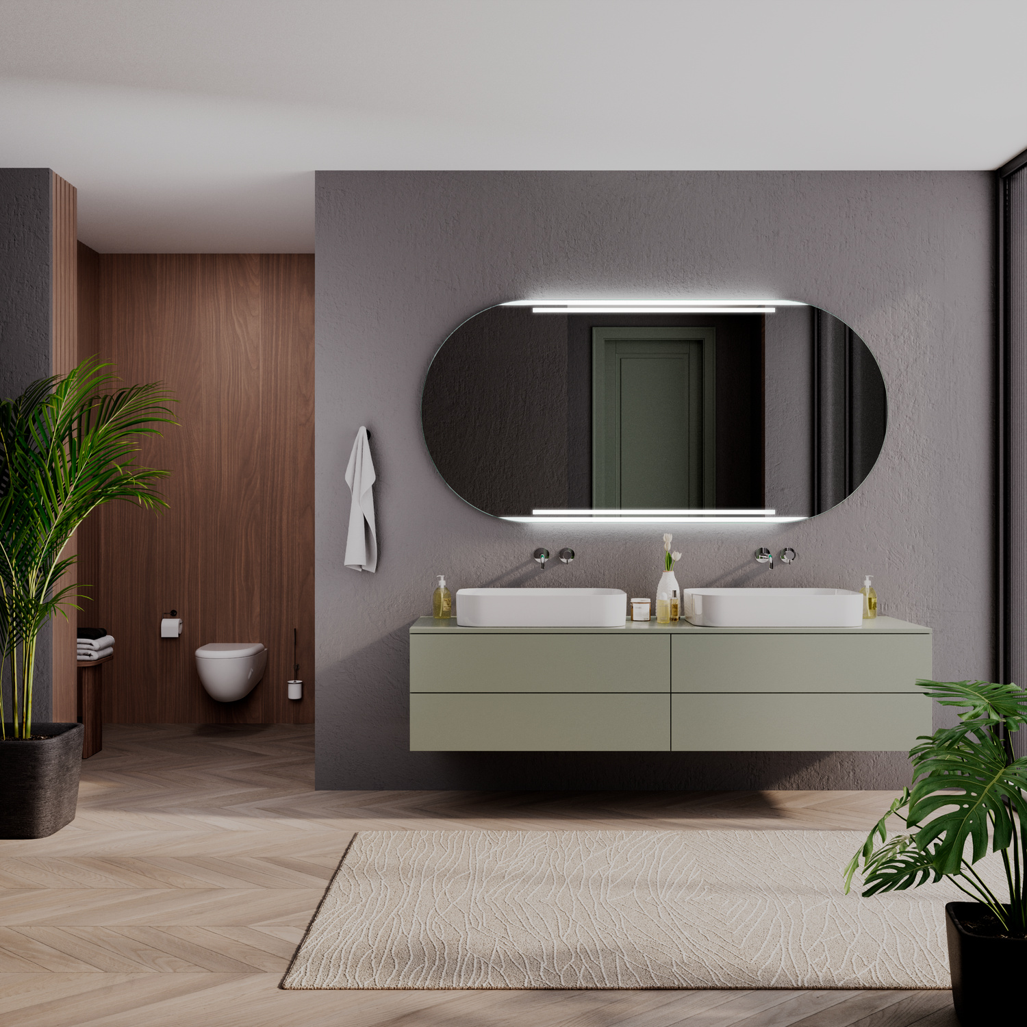 CASTRES OV ovaler LED-Badspiegel mit eingeschalteter Beleuchtung, 1500x1500 mm, warmweißes Licht in zwei horizontalen Streifen, rahmenlos, über olivgrünem schwebendem Waschtisch mit zwei weißen Aufsatzwaschbecken, modernes Bad mit anthrazitfarbener Wand
