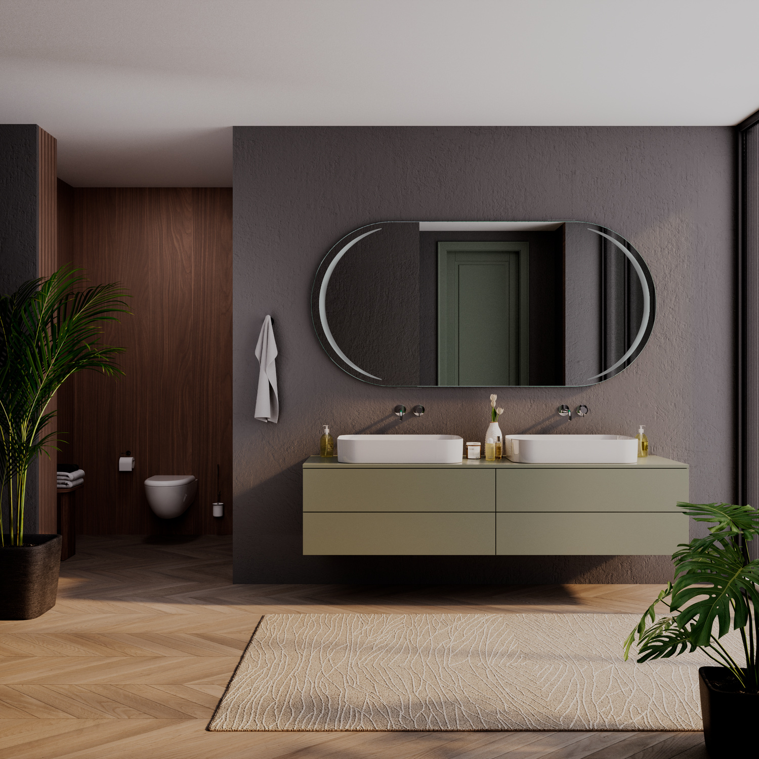 NELAS OV ovaler LED-Badspiegel mit ausgeschalteter Beleuchtung, 1500x1500 mm, über zwei weißen rechteckigen Aufsatzwaschbecken auf olivgrünem schwebendem Waschtisch, luxuriöses Bad mit dunkelgrauer Wand, Holzverkleidung, Grünpflanzen und hellem Teppich