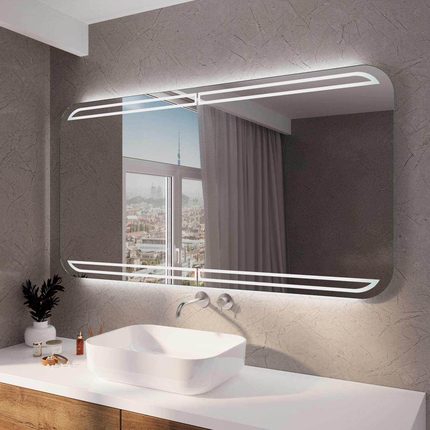 RAM RAD rechteckiger LED-Badspiegel mit abgerundeten Ecken, 1500x1500 mm, eingeschaltete warmweiße LED-Beleuchtung leuchtend, über weißem Waschtisch mit rundem Aufsatzwaschbecken, graues modernes Bad mit Fenster und Stadtblick