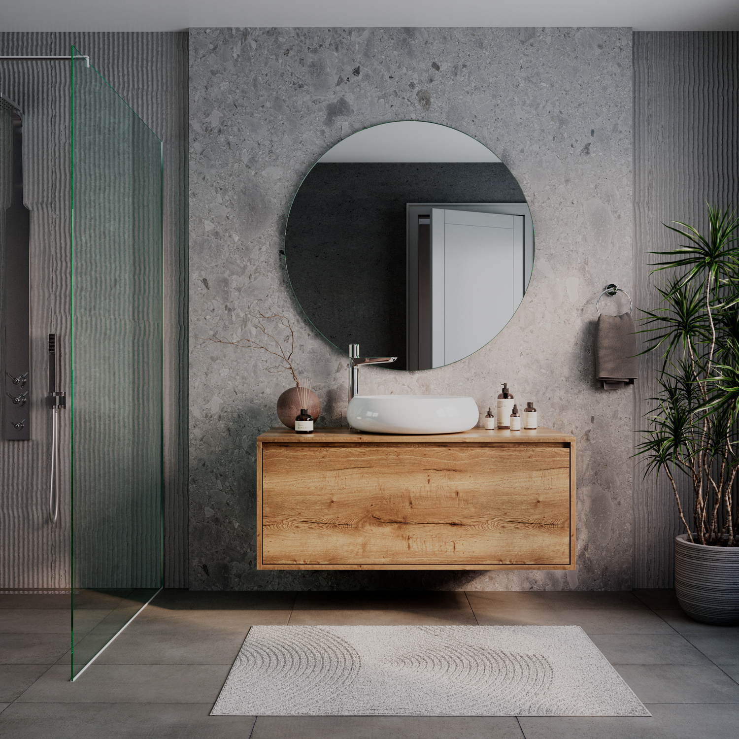 PURE runder LED-Kosmetikspiegel mit ausgeschalteter Beleuchtung, 1500x1500 mm, freistehend auf modernem Holzwaschtisch, elegantes Bad mit grauer Betonwand, grüner Glastrennwand, Pflanze und weißem Teppich