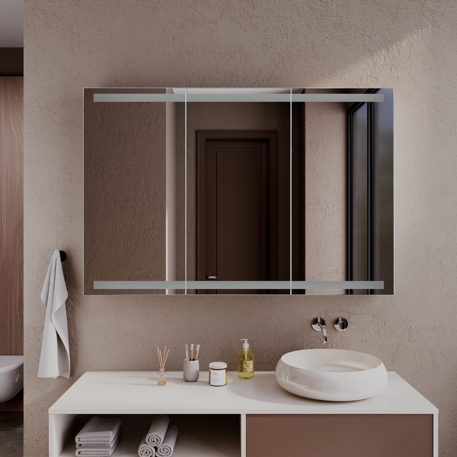 Spiegelschrank Modell Aurelia aus Nahaufnahme mit ausgeschalteter Beleuchtung, moderne Badezimmergestaltung mit beiger Wand und rundem Waschbecken.